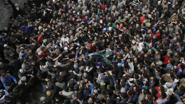Three militants, including one who allegedly killed a policeman in Srinagar last month, were shot dead in an encounter with security forces early on Monday, police said. Two of the slain militants have been identified as Eesa Fazli of Srinagar and Syed Owais Shafi of south Kashmir’s Kokernag, while the identity of the third is being ascertained, a police statement said. (Mukhtar Khan / AP) Three militants, including one who allegedly killed a policeman in Srinagar last month, were shot dead in an encounter with security forces early on Monday, police said. Two of the slain militants have been identified as Eesa Fazli of Srinagar and Syed Owais Shafi of south Kashmir’s Kokernag, while the identity of the third is being ascertained, a police statement said. (Mukhtar Khan / AP)