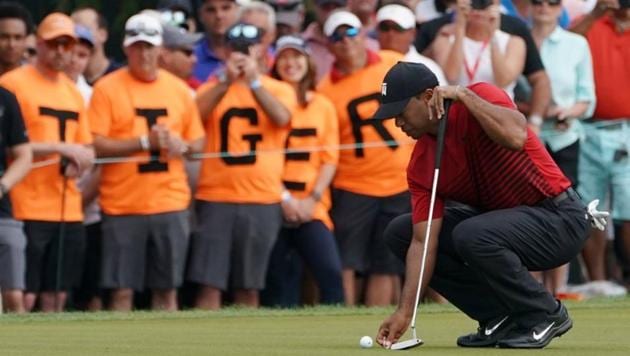 Tiger Woods lines up his putt on the 13th during the final round of the Valspar Championship golf tournament at Innisbrook Resort - Copperhead Course on Sunday. (Reuters/Jasen Vinlove-USA Today) Tiger Woods lines up his putt on the 13th during the final round of the Valspar Championship golf tournament at Innisbrook Resort - Copperhead Course on Sunday. (Reuters/Jasen Vinlove-USA Today)