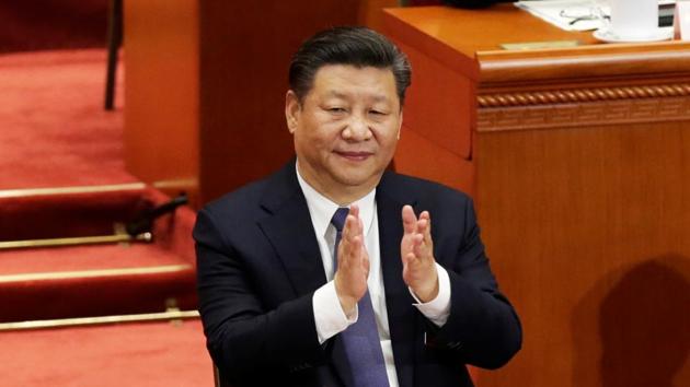 Chinese President Xi Jinping applauds after the parliament passed a constitutional amendment lifting presidential term limits, at the third plenary session of the National People's Congress, Great Hall of the People, Beijing, China, March 11, 2018(REUTERS) Chinese President Xi Jinping applauds after the parliament passed a constitutional amendment lifting presidential term limits, at the third plenary session of the National People's Congress, Great Hall of the People, Beijing, China, March 11, 2018(REUTERS)