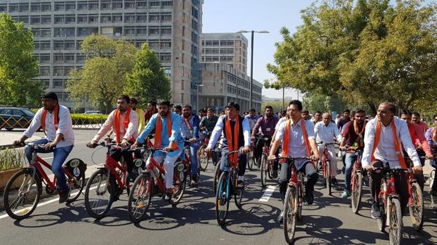 Union minister of state Mansukh Mandaviya (fourth from left) on his way to Gujarat assembly on Monday to file RS nomination for the second term.(HT PHOTO)