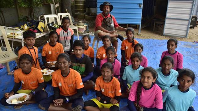 Among clubs offering lessons, the one at Hussain Sagar Lake in Hyderabad run by Suheim Sheikh (c-seated), coach and president of the nine-year-old yacht club, has been training children from low-income groups for free. The club aims to train 100 girls to build competition. “The perception is that this is a rich man’s sport. But access to water is less expensive than building a stadium.” he said. (Arijit Sen / HT Photo)