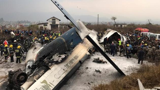 At least 50 people were killed when a Bangladeshi airliner with 71 people on board crashed while landing at the airport in the Nepalese capital Kathmandu on Monday. A police official said at least 10 people were still unaccounted for. (Navesh Chitrakar / REUTERS)