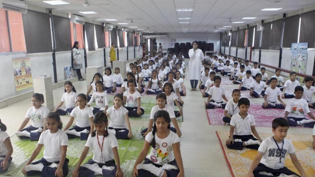 Yoga is currently deemed an extracurricular activities. (HT File Photo) Yoga is currently deemed an extracurricular activities. (HT File Photo)