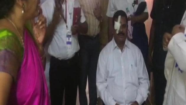 Telangana legislative council chairman K Swamy Goud suffered injuries on his right eye on Monday when a protesting Congress MLA, K V Reddy, threw a headphone at the speaker’s podium during governor E S L Narasimhan’s address to the joint session of the state legislature. (ANI/Twitter) Telangana legislative council chairman K Swamy Goud suffered injuries on his right eye on Monday when a protesting Congress MLA, K V Reddy, threw a headphone at the speaker’s podium during governor E S L Narasimhan’s address to the joint session of the state legislature. (ANI/Twitter)