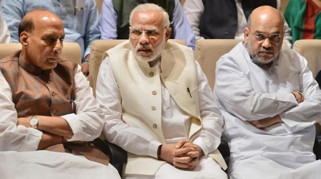 Prime Minister Narendra Modi, BJP president Amit Shah and home minister Rajnath Singh attend a BJP parliamentary party meeting in New Delhi on Tuesday. (PTI) Prime Minister Narendra Modi, BJP president Amit Shah and home minister Rajnath Singh attend a BJP parliamentary party meeting in New Delhi on Tuesday. (PTI)