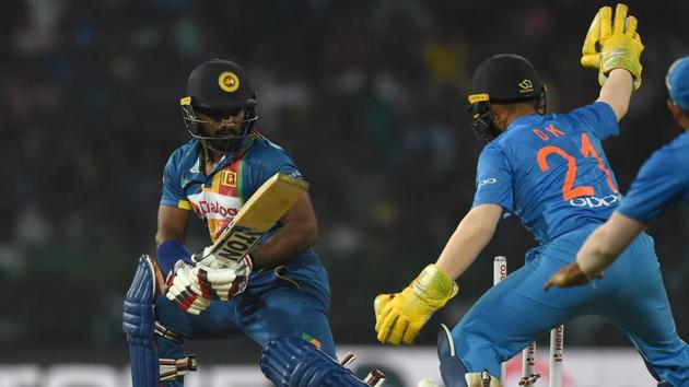 Sri Lanka cricketer Kusal Perera (L) is dismissed by Indian cricketer Washington Sunda. (AFP) Sri Lanka cricketer Kusal Perera (L) is dismissed by Indian cricketer Washington Sunda. (AFP)