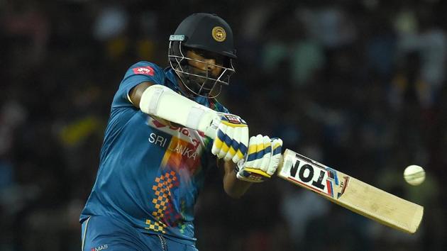 Sri Lankan cricketer Thisara Perera plays a shot during the fourth Twenty20 (T20) international between India and Sri Lanka for the tri-nation Nidahas Trophy at The R. Premadasa Stadium in Colombo on March 12, 2018.(AFP)