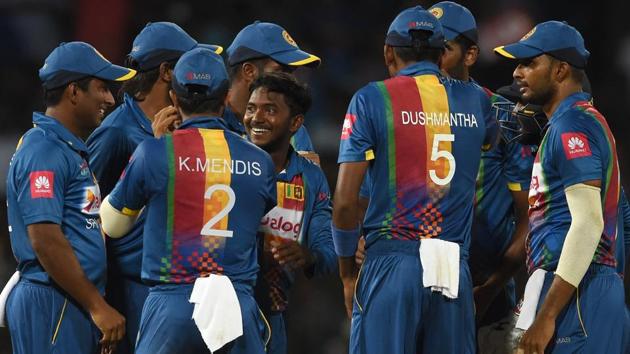Sri Lankan cricketer Akila Dananjaya (C) celebrates with teammates after dismissing Shikhar Dhawan. (AFP) Sri Lankan cricketer Akila Dananjaya (C) celebrates with teammates after dismissing Shikhar Dhawan. (AFP)