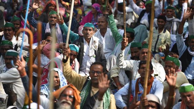 Farmers protest against the central government demanding waiver of dues and loans and implementation of the MS Swaminathan Committee report at Parliament street, near Jantar Mantar, in New Delhi on Tuesday. (Raj K Raj / HT Photo) Farmers protest against the central government demanding waiver of dues and loans and implementation of the MS Swaminathan Committee report at Parliament street, near Jantar Mantar, in New Delhi on Tuesday. (Raj K Raj / HT Photo)