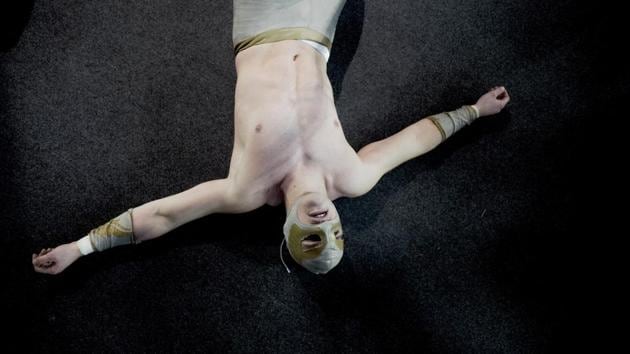 Wrestler Ace Angel lies on the ground after being thrown out of the ring during a match. Those attending included people from all walks of life, many talking about the injustice of France’s decades high unemployment. (Kamil Zihnioglu / AP) Wrestler Ace Angel lies on the ground after being thrown out of the ring during a match. Those attending included people from all walks of life, many talking about the injustice of France’s decades high unemployment. (Kamil Zihnioglu / AP)