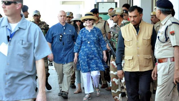 Former US politican Hillary Clinton (C) walks out of Jodhpur Airport upon her arrival in Jodhpur, Rajasthan on Tuesday. (Sunil Verma / AFP) Former US politican Hillary Clinton (C) walks out of Jodhpur Airport upon her arrival in Jodhpur, Rajasthan on Tuesday. (Sunil Verma / AFP)