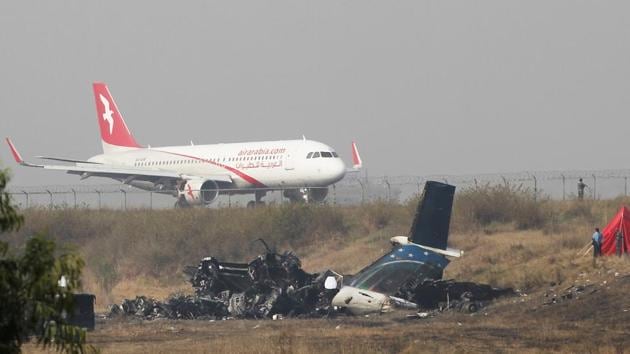 Remains of Bangladesh's US-Bangla Flight BS211 on the ground at the Tribhuvan International Airport in Kathmandu, Nepal, on Tuesday. The crash at Nepal's main airport killed 49 of the 71 people on board, and police said Tuesday an investigation was ordered into the cause of the accident, after news came out that confusion over landing instructions led to the crash as the plane flew low and became unstable before hitting the ground and bursting into flames. Bangladesh cricket team players will wear a black armband during their Nidahas Trophy match vs Indian cricket team to honour the crash victims. (AP) Remains of Bangladesh's US-Bangla Flight BS211 on the ground at the Tribhuvan International Airport in Kathmandu, Nepal, on Tuesday. The crash at Nepal's main airport killed 49 of the 71 people on board, and police said Tuesday an investigation was ordered into the cause of the accident, after news came out that confusion over landing instructions led to the crash as the plane flew low and became unstable before hitting the ground and bursting into flames. Bangladesh cricket team players will wear a black armband during their Nidahas Trophy match vs Indian cricket team to honour the crash victims. (AP)