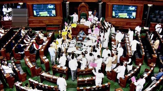Opposition members protest during the ongoing budget session of Parliament at the Lok Sabha in New Delhi on Monday. (PTI Photo) Opposition members protest during the ongoing budget session of Parliament at the Lok Sabha in New Delhi on Monday. (PTI Photo)