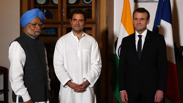 French President Emmanuel Macron, Congress president Rahul Gandhi and former prime minister Manmohan Singh pose for a photograph ahead of a meeting at the French embassy in New Delhi. (Reuters Photo) French President Emmanuel Macron, Congress president Rahul Gandhi and former prime minister Manmohan Singh pose for a photograph ahead of a meeting at the French embassy in New Delhi. (Reuters Photo)