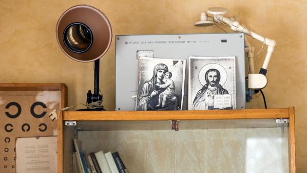 Images of religious icons are displayed alongside old equipment in a clinic in the village of Gvozdyv. His practice, 35 kilometres outside Kiev, is still stuck with Soviet-era medical equipment and lacks basic supplies. Life expectancy in Ukraine is on average five years shorter than the European average, according to the World Health Organization. (Gleb Garanich / REUTERS) Images of religious icons are displayed alongside old equipment in a clinic in the village of Gvozdyv. His practice, 35 kilometres outside Kiev, is still stuck with Soviet-era medical equipment and lacks basic supplies. Life expectancy in Ukraine is on average five years shorter than the European average, according to the World Health Organization. (Gleb Garanich / REUTERS)