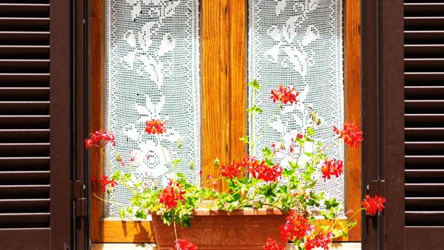 White lace curtains lend an elegant look to the house.(Photo: Istock)