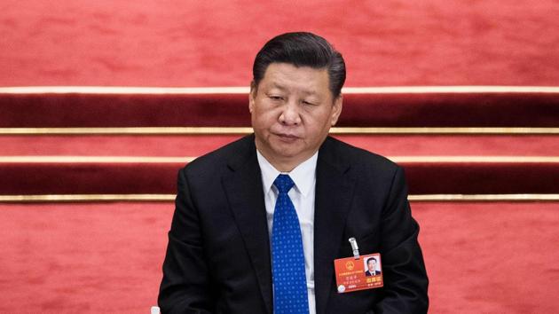 China's President Xi Jinping attends the fourth plenary session of the National People's Congress at the Great Hall of the People in Beijing on March 13, 2018. (AFP) China's President Xi Jinping attends the fourth plenary session of the National People's Congress at the Great Hall of the People in Beijing on March 13, 2018. (AFP)