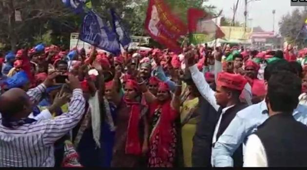 Samajwadi Party and Bahujan Samaj Party workers celebrate in Gorakhpur as their party candidate leads in UP bypolls on Wednesday.(ANI Twitter Photo)