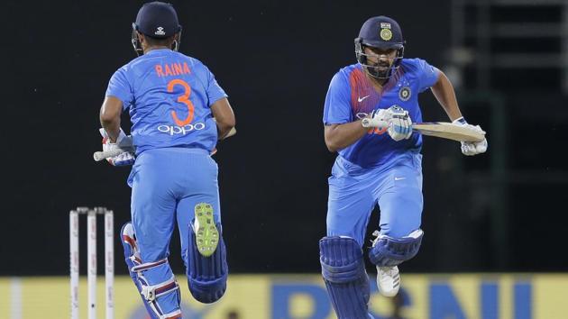 Rohit Sharma and Suresh Raina hit a 102-run second wicket partnership which proved to be the difference between the two sides. (AP)