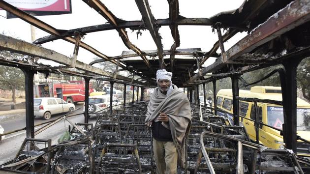 A Haryana Roadways bus was set on fire near Bhondsi village in Gurgaon allegedly by activists of Karni Sena, who were protesting against the release of film Padmaavat. (Sanjeev Verma/HT PHOTO) A Haryana Roadways bus was set on fire near Bhondsi village in Gurgaon allegedly by activists of Karni Sena, who were protesting against the release of film Padmaavat. (Sanjeev Verma/HT PHOTO)