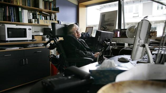 Hawking seen in his office at The Centre for Mathematical Sciences in Cambridge, England in September 2007. Even though his body was attacked by amyotrophic lateral sclerosis (ALS) when Hawking was 21, he stunned doctors defying predictions that he would live only a few more years. “I am quite often asked: how do you feel about having ALS?” he once wrote. “The answer is, not a lot.” (Leon Neal / AFP File)