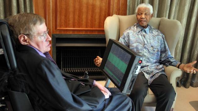 Nelson Mandela (R) meets with British scientist Professor Stephen Hawking (L) on May 14, 2008 in Johannesburg. Hawking’s genius brought him global fame and renown as a witty communicator dedicated to bringing science to a wider audience. His 1988 book “A Brief History of Time” sought to explain to non-scientists the fundamental theories of the universe and became an international bestseller. It was followed in 2001 by “The Universe in a Nutshell”. (Denis Farrell / AFP File)