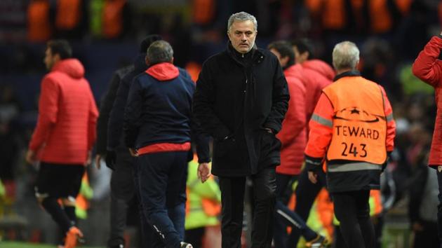 Manchester United manager 's Jose Mourinho leaves the pitch after losing a last 16 second leg UEFA Champions League football match between Manchester United and Sevilla at Old Trafford in Manchester.(AFP)