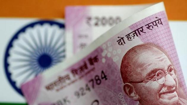 On Tuesday, the rupee had gained 15 paise to close at 64.89 against the US currency on heavy foreign fund inflows after strong macro-economic data. (Reuters File) On Tuesday, the rupee had gained 15 paise to close at 64.89 against the US currency on heavy foreign fund inflows after strong macro-economic data. (Reuters File)