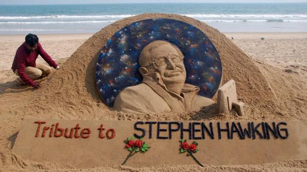 Sand artist Sudarsan Patnaik gives final touches to a sculpture in honour of British physicist and award-winning author Stephen Hawking at Puri beach on Wednesday. Hawking passed away today, aged 76. Propelled to superstardom by his 1988 book “A Brief History of Time”, Hawking dedicated his life to unlocking the secrets of the Universe. (Asit Kumar / AFP) Sand artist Sudarsan Patnaik gives final touches to a sculpture in honour of British physicist and award-winning author Stephen Hawking at Puri beach on Wednesday. Hawking passed away today, aged 76. Propelled to superstardom by his 1988 book “A Brief History of Time”, Hawking dedicated his life to unlocking the secrets of the Universe. (Asit Kumar / AFP)