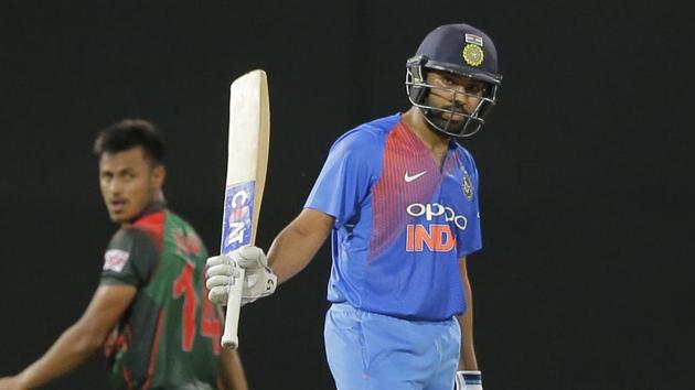 India's Rohit Sharma celebrates scoring fifty runs against Bangladesh during their second Twenty20 cricket match in Nidahas triangular series in Colombo, Sri Lanka, Wednesday, March 14, 2018. (AP Photo/Eranga Jayawardena)(AP)