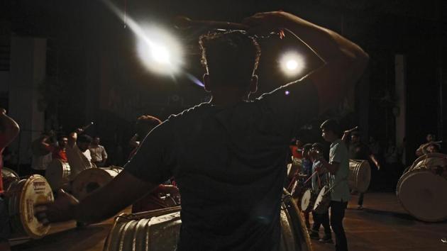 The dhol is a large double-headed drum slung over the neck of the player. (Hemanshi Kamani/HT PHOTO) 