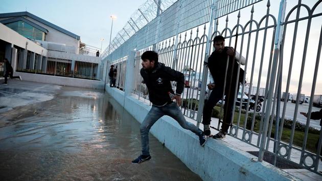 This route from the departures pier at Patras, at one of two ports linking Greece to Italy, isn’t new but when Europe’s refugee crisis began in 2015 and nearly a million people landed in Greece on boats, taking the overland road to countries like Germany turned out to be the safer option. (Alkis Konstantinidis / REUTERS) This route from the departures pier at Patras, at one of two ports linking Greece to Italy, isn’t new but when Europe’s refugee crisis began in 2015 and nearly a million people landed in Greece on boats, taking the overland road to countries like Germany turned out to be the safer option. (Alkis Konstantinidis / REUTERS)