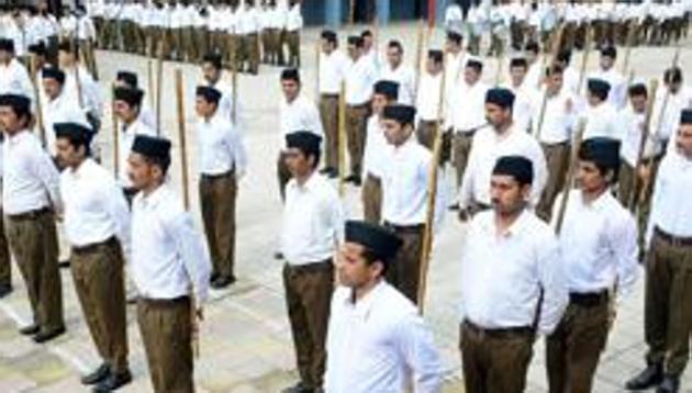 File photo of RSS volunteers in Shimla. The flag hoisting event in Ranchi was planned by Vipul Singh and six other RSS workers, four of whom have suffered burn injuries.(HT / For representative purpose only)