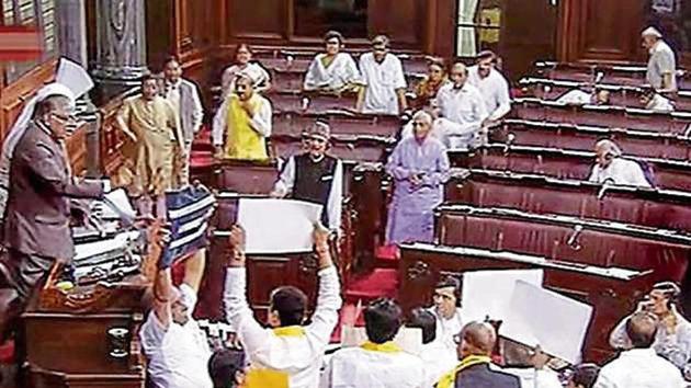 Ruckus in the Rajya Sabha over various issues in New Delhi on Thursday. (PTI photo) Ruckus in the Rajya Sabha over various issues in New Delhi on Thursday. (PTI photo)