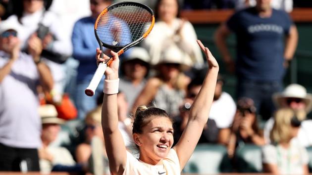 Simona Halep celebrates her win against Petra Martic during the BNP Paribas Open at the Indian Wells Tennis Garden on Wednesday. (AFP) Simona Halep celebrates her win against Petra Martic during the BNP Paribas Open at the Indian Wells Tennis Garden on Wednesday. (AFP)