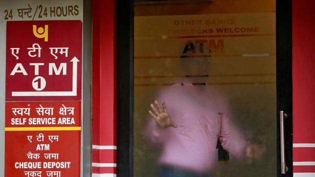 A man leaves an automated teller machine facility of Punjab National Bank in New Delhi. (Reuters File Photo) A man leaves an automated teller machine facility of Punjab National Bank in New Delhi. (Reuters File Photo)