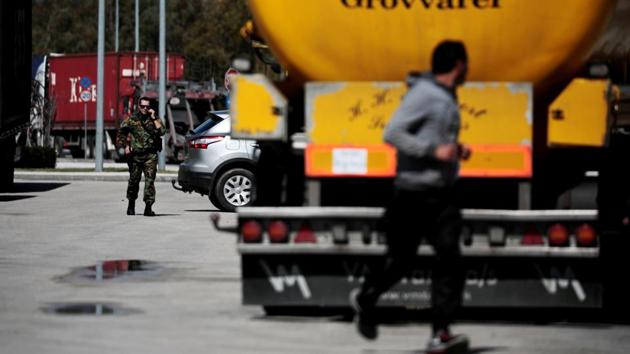 A migrant runs away from a truck as a coast guard officer approaches. No one can say how many make it across. Italian authorities returned 147 people to Greece last year, up from 112 in 2016 and 44 in January and February, according to Greek data. (Alkis Konstantinidis / REUTERS) A migrant runs away from a truck as a coast guard officer approaches. No one can say how many make it across. Italian authorities returned 147 people to Greece last year, up from 112 in 2016 and 44 in January and February, according to Greek data. (Alkis Konstantinidis / REUTERS)