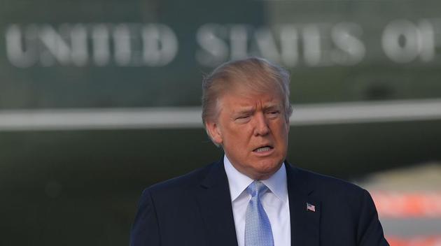 US President Donald Trump makes his way from Marine One to board Air Force One before departing from Los Angeles International Airport in Los Angeles on March 14, 2018. (AFP FILE) US President Donald Trump makes his way from Marine One to board Air Force One before departing from Los Angeles International Airport in Los Angeles on March 14, 2018. (AFP FILE)