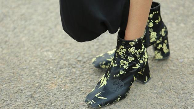 Floral booties  looked sassy and made for a cool pick for our street style spotting.  (Photo: Amal KS/HT) 