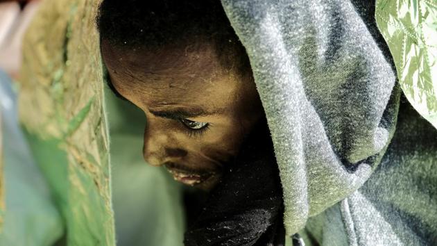 A 22-year-old Eritrean man is seen on Proactiva Open Arms rescue ship after being rescued in the Mediterranean sea off Libya’s coast. (Kepa Fuentes / REUTERS) A 22-year-old Eritrean man is seen on Proactiva Open Arms rescue ship after being rescued in the Mediterranean sea off Libya’s coast. (Kepa Fuentes / REUTERS)