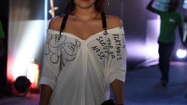 Shirts were worn in off-shouldered style and had slogans written on it. (Photo: Sarang Gupta/HT) Shirts were worn in off-shouldered style and had slogans written on it. (Photo: Sarang Gupta/HT)