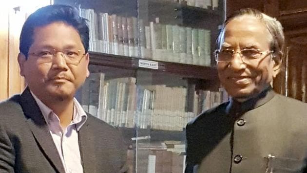 Meghalaya chief minister Conrad Sangma with governor Ganga Prasad at Raj Bhawan in Shillong. (PTI File) Meghalaya chief minister Conrad Sangma with governor Ganga Prasad at Raj Bhawan in Shillong. (PTI File)