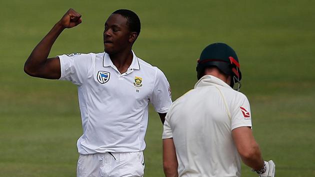 South Africa bowler Kagiso Rabada celebrates taking the wicket of Australia batsman Shaun Marsh during day three of the second cricket Test at St George’s Park in Port Elizabeth, on March 11, 2018.(AFP)