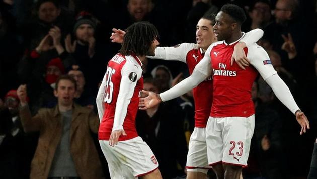Arsenal's Danny Welbeck celebrates scoring their third goal against AC Milan in an UEFA Europa League match. (Action Images via Reuters) Arsenal's Danny Welbeck celebrates scoring their third goal against AC Milan in an UEFA Europa League match. (Action Images via Reuters)