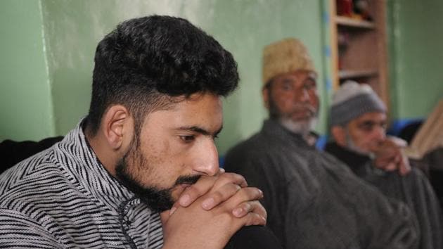 Kamran Yousuf, a Kashmiri photojournalist who was released on bail six months after his arrest by the National Investigation Agency, at his house in Tahab village of Pulwama district, South Kashmir, on Friday.(Waseem Andrabi/HT Photo)