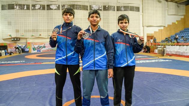 Medalists from Maharashtra at 20th sub- junior girls wrestling competition at Shiv Chhatrapati sports complex in Balewadi. (sanket wankhade/ht photo) Medalists from Maharashtra at 20th sub- junior girls wrestling competition at Shiv Chhatrapati sports complex in Balewadi. (sanket wankhade/ht photo)