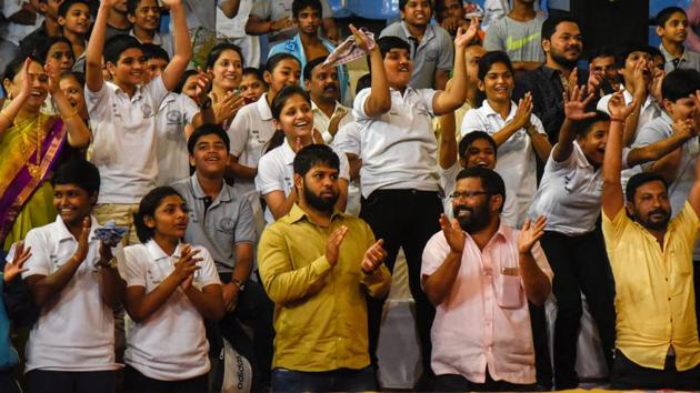 Spectators cheer up as Maharashtra's Atul Chechar bagged a silver medal in freestyle wrestling at sub junior wrestling tournament held at at Shiv Chhatrapati sports complex in Balewadi. (sanket wankhade/HT PHOTO) Spectators cheer up as Maharashtra's Atul Chechar bagged a silver medal in freestyle wrestling at sub junior wrestling tournament held at at Shiv Chhatrapati sports complex in Balewadi. (sanket wankhade/HT PHOTO)