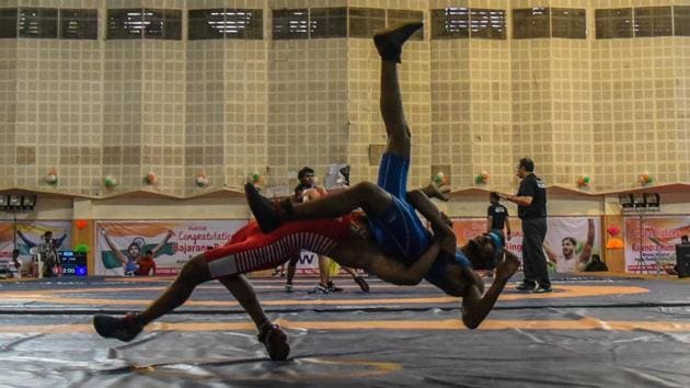 Contestants from different states fight it out on the mat at sub junior wrestling tournament held at Shiv Chhatrapati sports complex in Balewadi. (sanket wankhade/ht photo) Contestants from different states fight it out on the mat at sub junior wrestling tournament held at Shiv Chhatrapati sports complex in Balewadi. (sanket wankhade/ht photo)