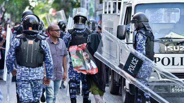 A file photo shows Maldivian police responding to a protest urging the release of opposition leaders held in jail in the Maldives capital Male. (AFP) A file photo shows Maldivian police responding to a protest urging the release of opposition leaders held in jail in the Maldives capital Male. (AFP)