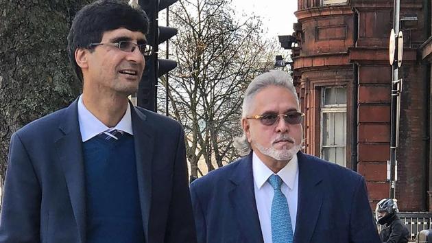Embattled liquor tycoon Vijay Mallya (R) arrives for a hearing at Westminster Magistrates’ Court, in London on Friday. (PTI photo) Embattled liquor tycoon Vijay Mallya (R) arrives for a hearing at Westminster Magistrates’ Court, in London on Friday. (PTI photo)